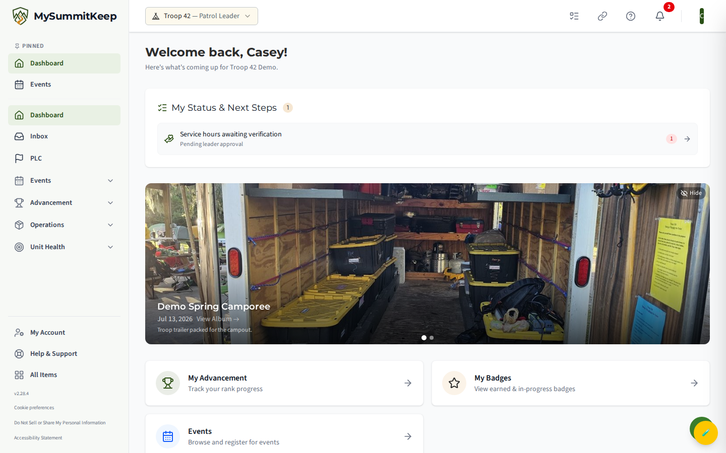 The Scout home page top-to-bottom: a 'Welcome back, [name]!' greeting, a photo carousel of recent unit events, three Quick Link cards (My Advancement, My Badges, Events), and the Upcoming Events list below.