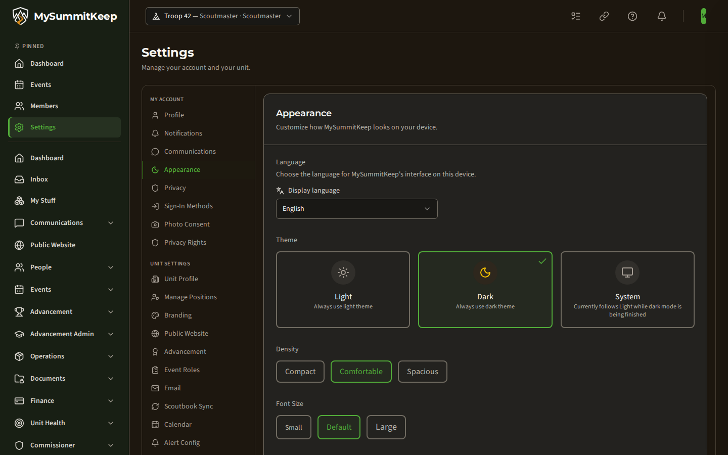 The Appearance settings page in dark mode, with the Language picker and the Light, Dark and System theme cards, Dark selected.